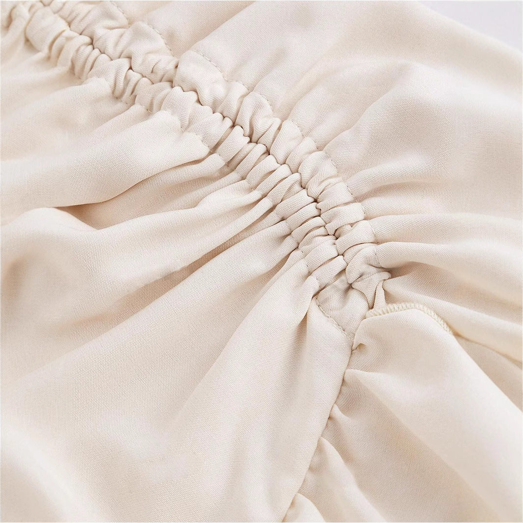 Jupe taille haute à ourlet asymétrique et ourlet en feuille de lotus