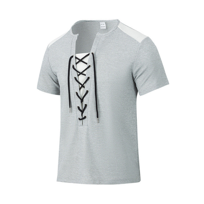 Pull d'été décontracté à manches courtes et col rond avec coutures multicolores